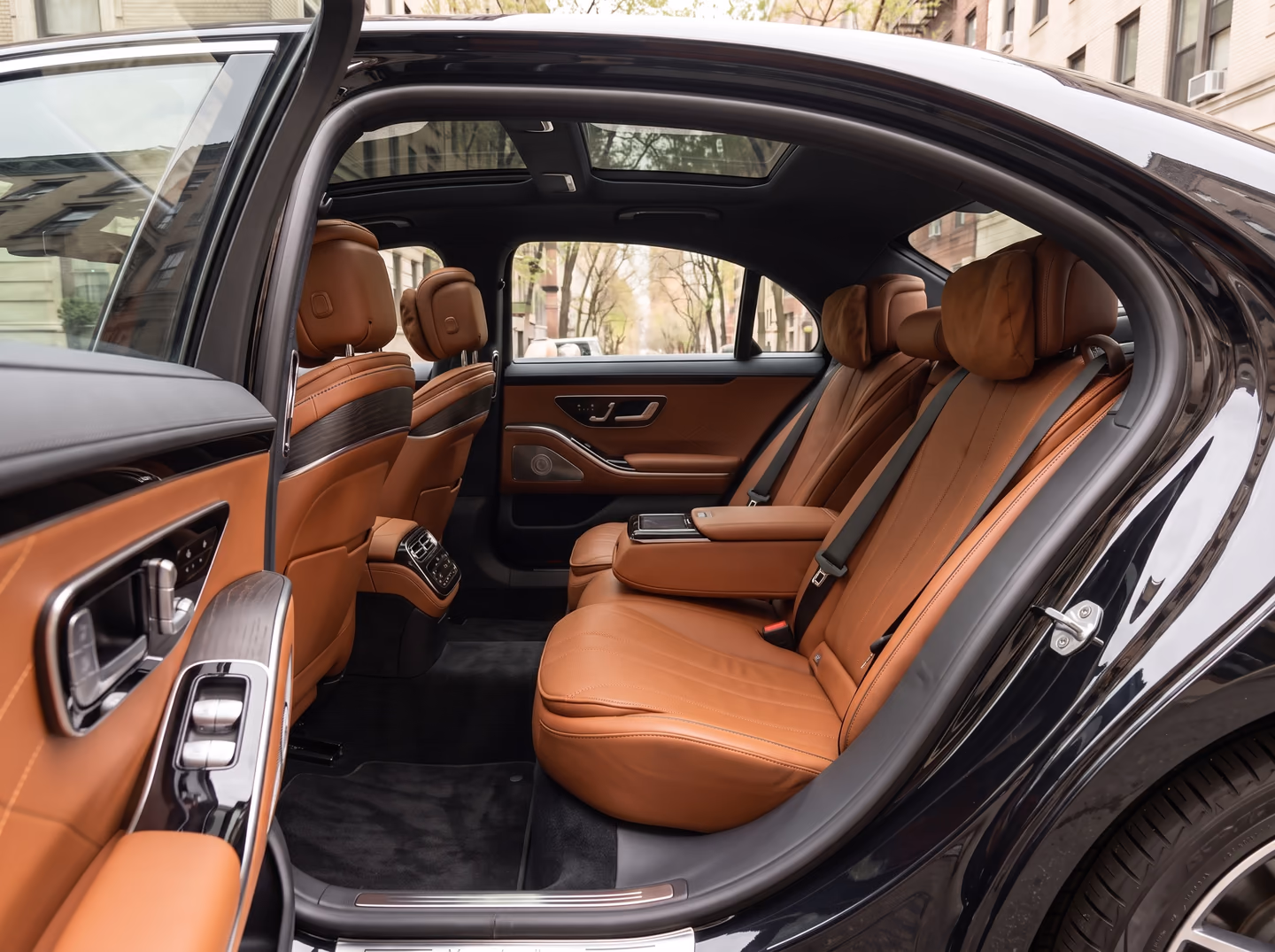 Illustrative Mercedes-Benz S580 cognac leather rear cabin
